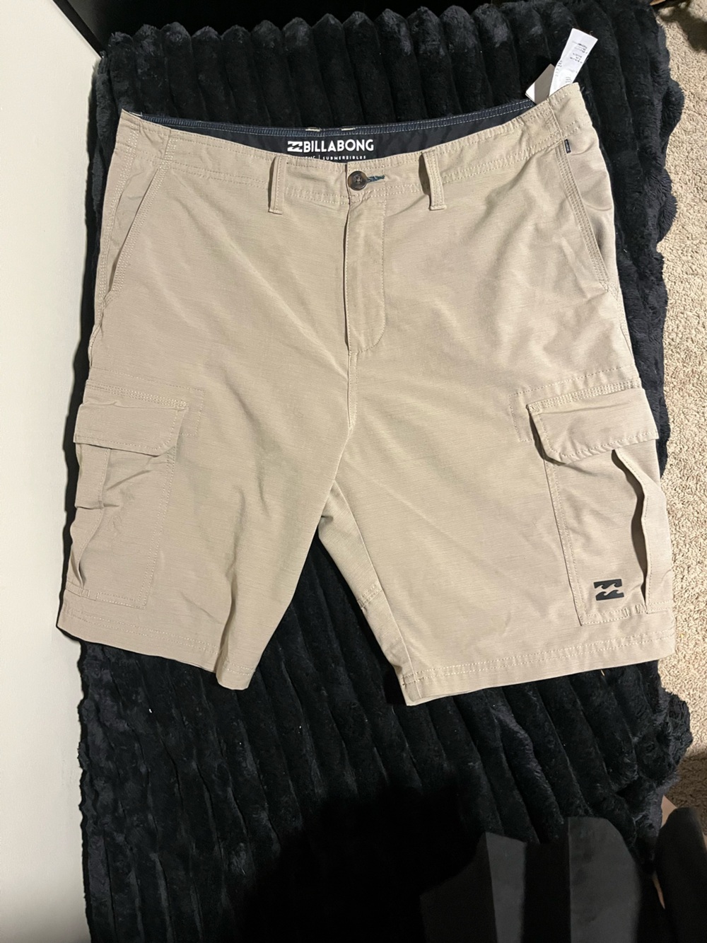 Khaki colored billabong cargo shorts